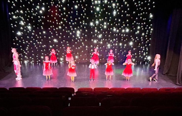 Students performing energetic closing number at Clairemarie’s annual show